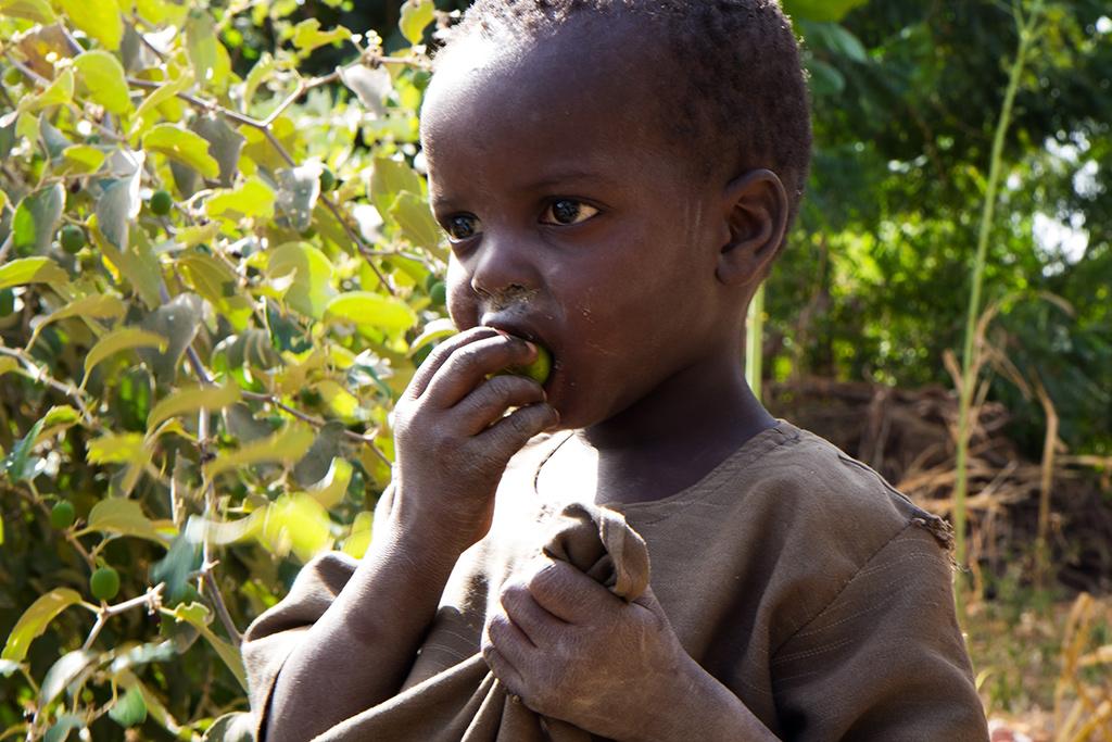 A child enjoying fruit